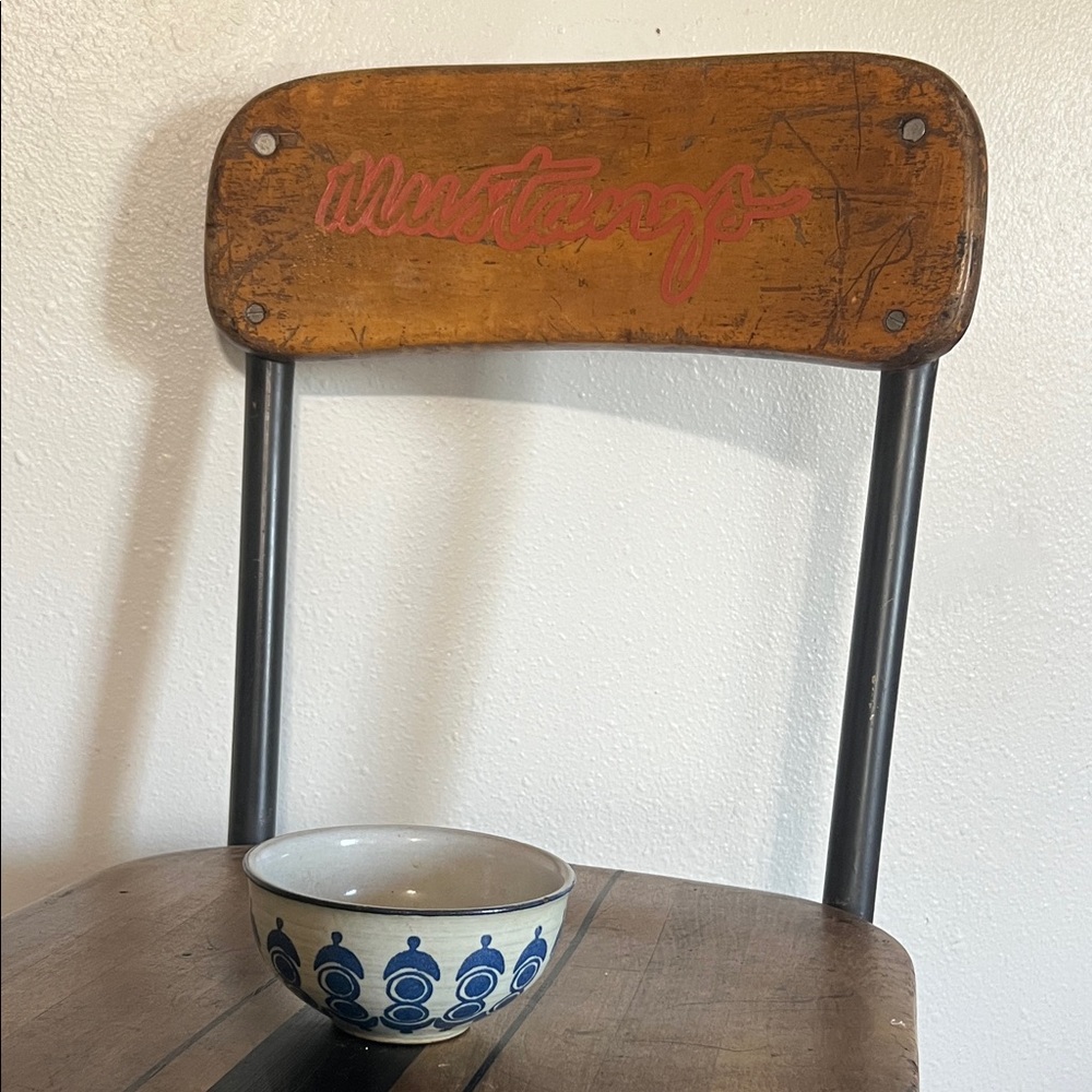 Handmade pottery bowl with blue pattern design